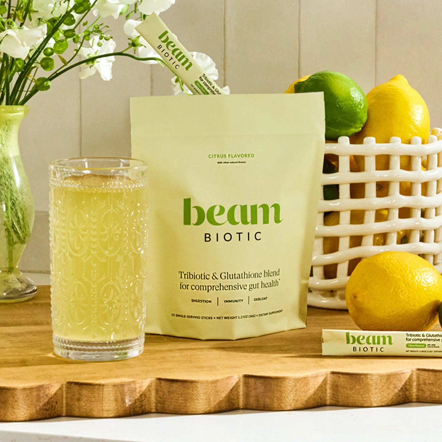 Biotic powder pack styled in a bright kitchen with lemons.